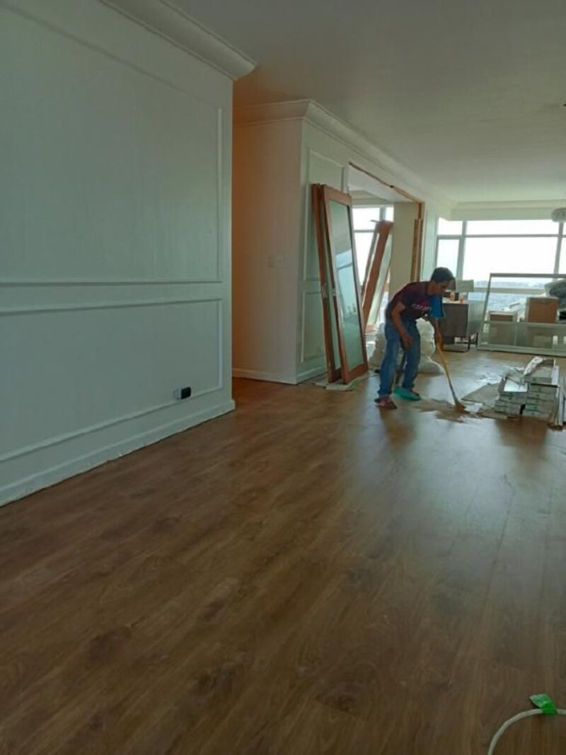 J&L crew installing wood flooring on site
