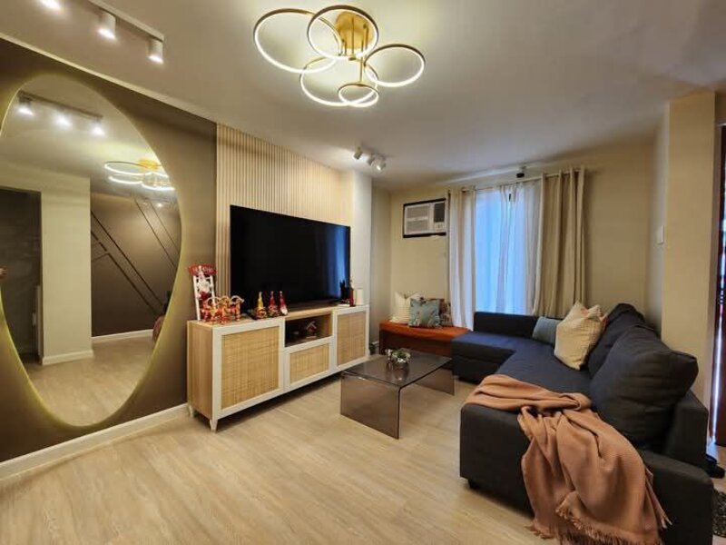 Contemporary living room with LED mirror and modern furniture